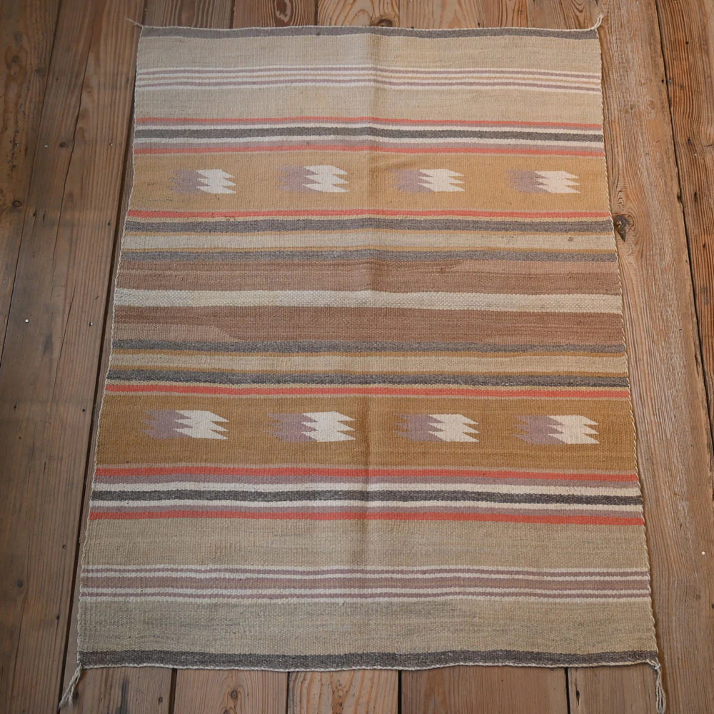 What is approximate age of this Vintage Navajo Rug?