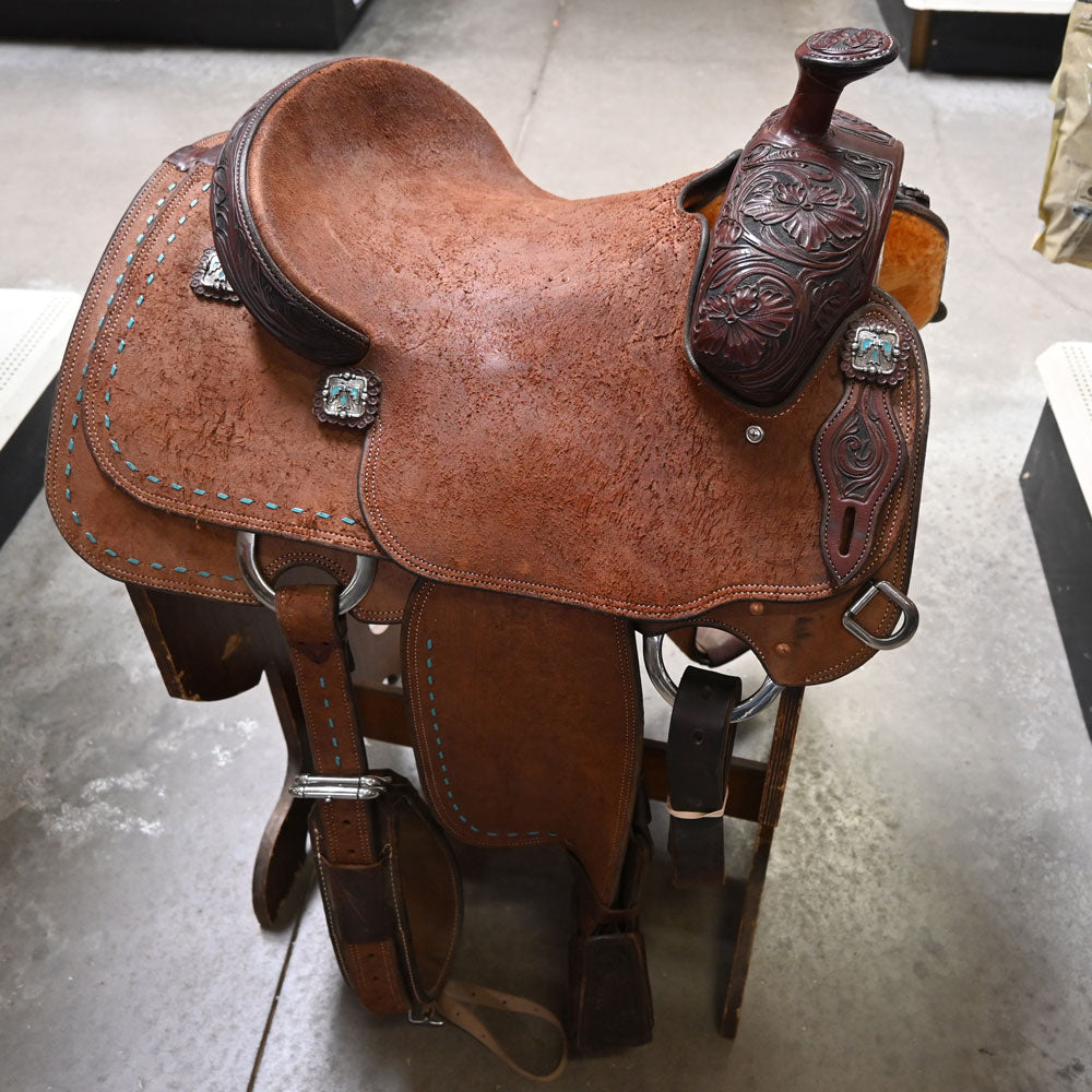 What is the gullet measurement on this 14" USED ADAM TANNER ROPING SADDLE?