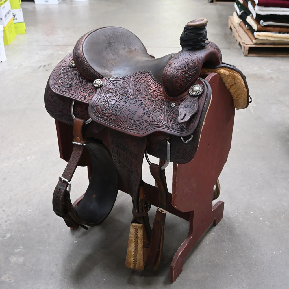 What is the gullet size on this 15.5" USED INFINITY TEAM ROPING SADDLE and the skirt length?