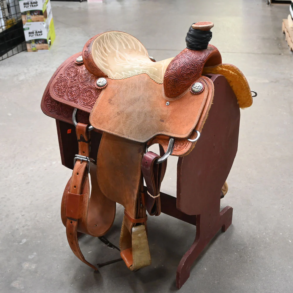 Could you tell me the approximate weight of the 14" USED CACTUS RELENTLESS TEAM ROPING SADDLE?