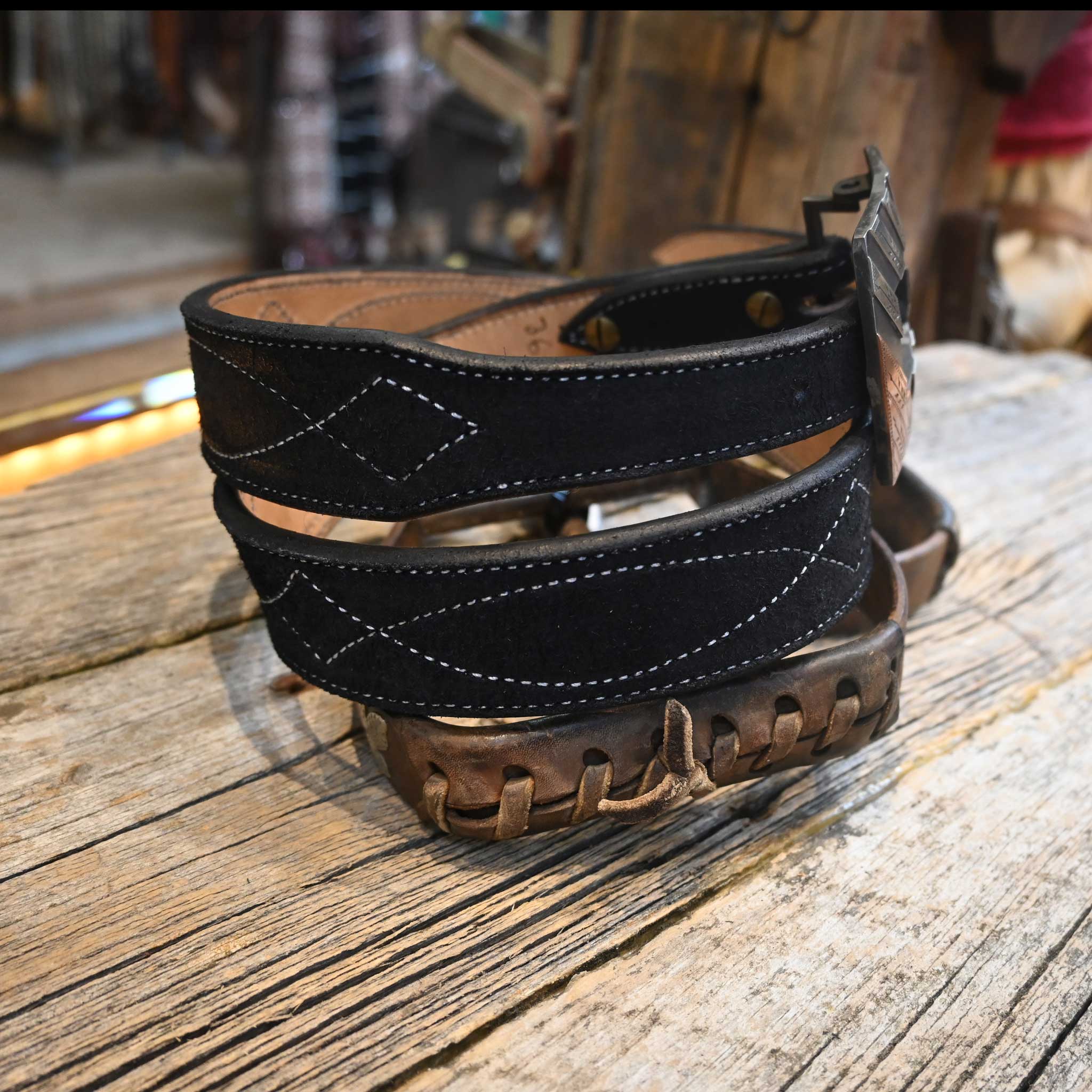 I see this Adam Lahey Black Stitched Roughout Belt is tapered. Is it 1 3/4 tapered to 1 1/2 or is it already 1 1/2 tapered down?