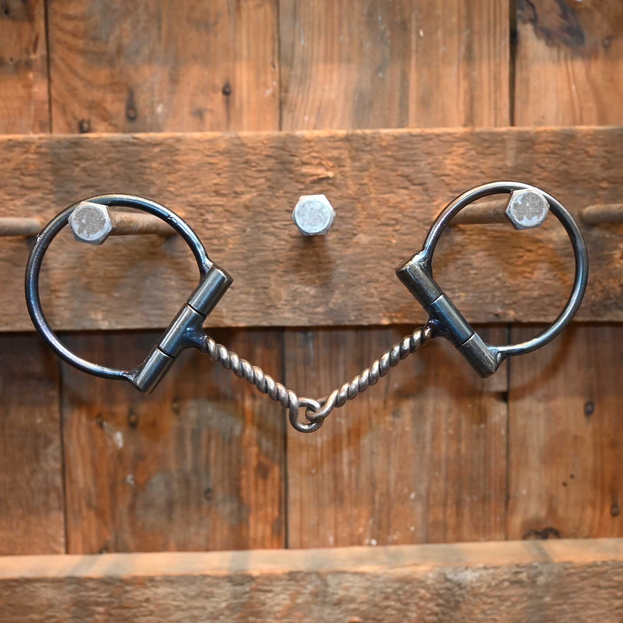 How big are the cheek pieces on the Pat Stevens Twisted Wire D-Ring Snaffle Bit and is the mouthpiece completely straight or curved?