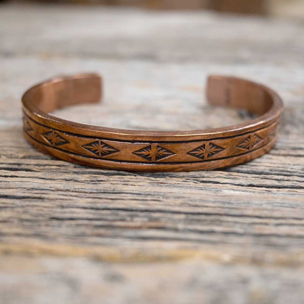 Engraved Copper Cuffs by F. Coriz