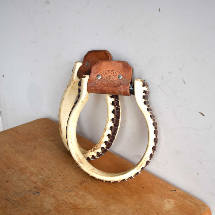 Used Billy Cook Oxbow Rawhide Covered Stirrups