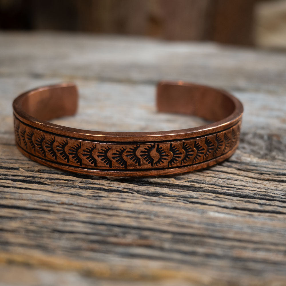Engraved Copper Cuffs by F. Coriz