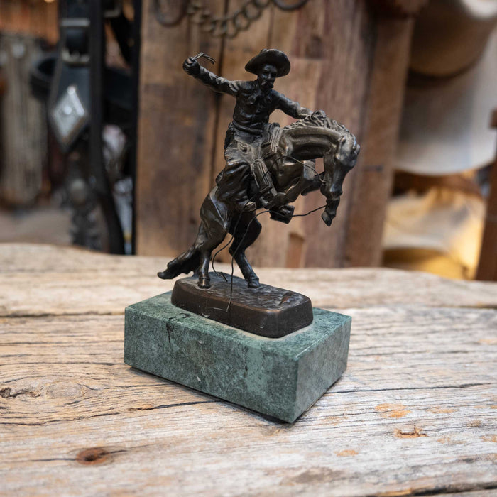 Remington Bronc Riding Cowboy Statue