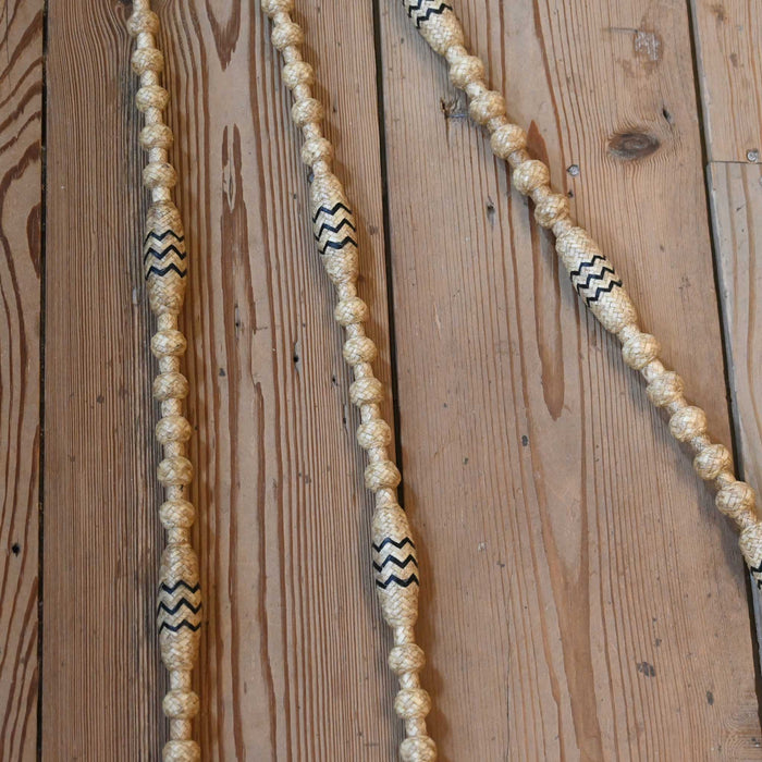 Hand Braided 110" Rawhide Romel Reins