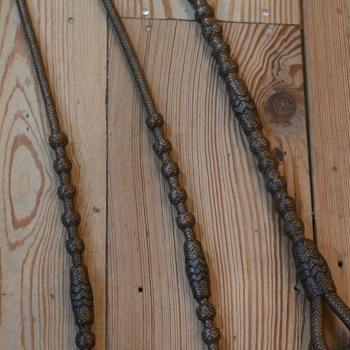 Hand Braided 106" Rawhide Romel Reins