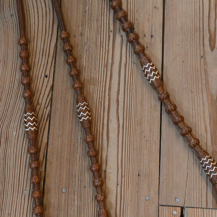 Hand Braided 110" Rawhide Romel Reins