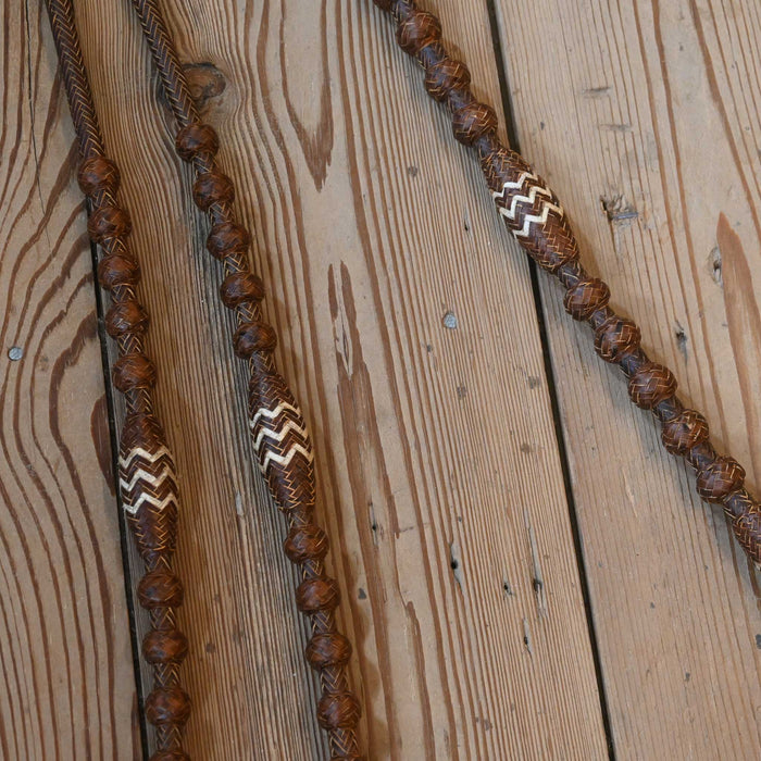 Hand Braided 110" Rawhide Romel Reins