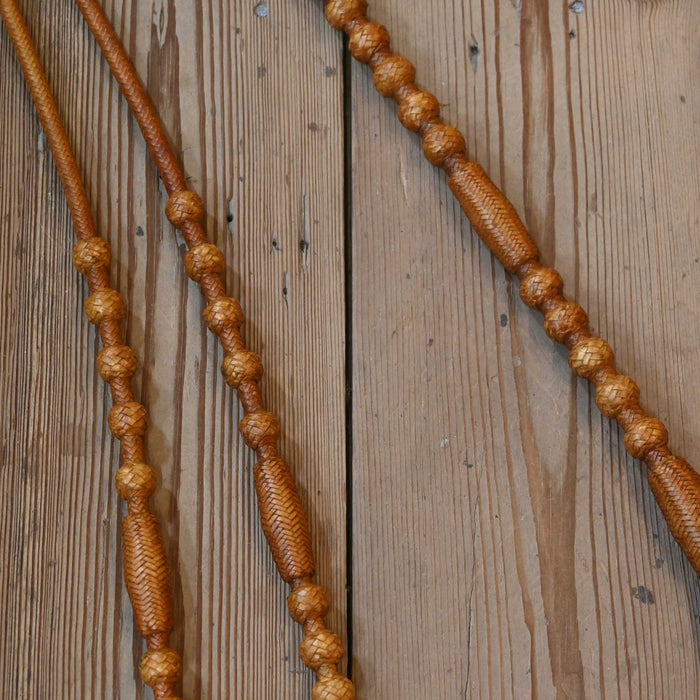 Hand Braided 110" Rawhide Romel Reins