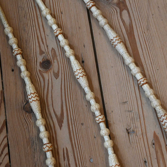 Hand Braided 110" Rawhide Romel Reins