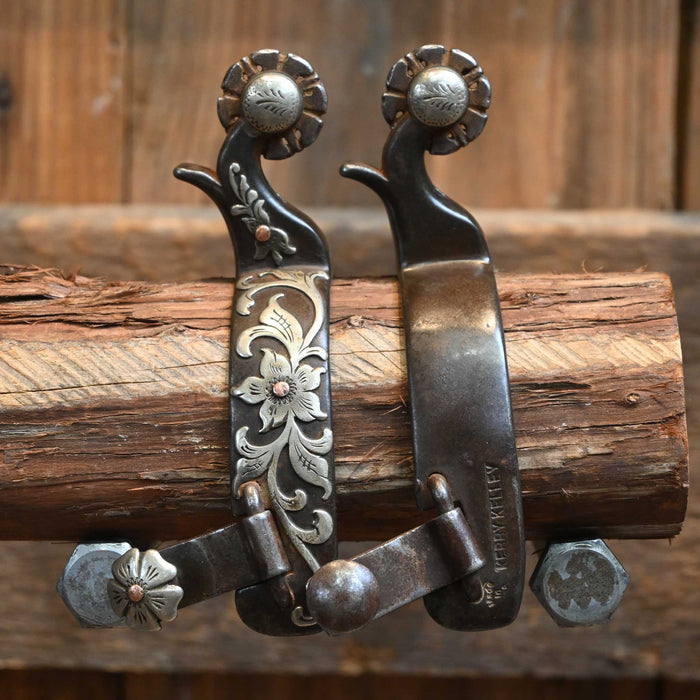 Kerry Kelley Teal Spurs