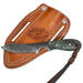 A fixed-blade knife with a dark green handle and a silver steel blade, shown resting on its brown leather sheath with a braided leather lanyard against a white background.