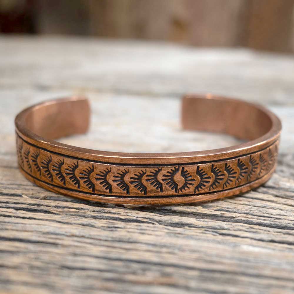 Engraved Copper Cuffs by F. Coriz